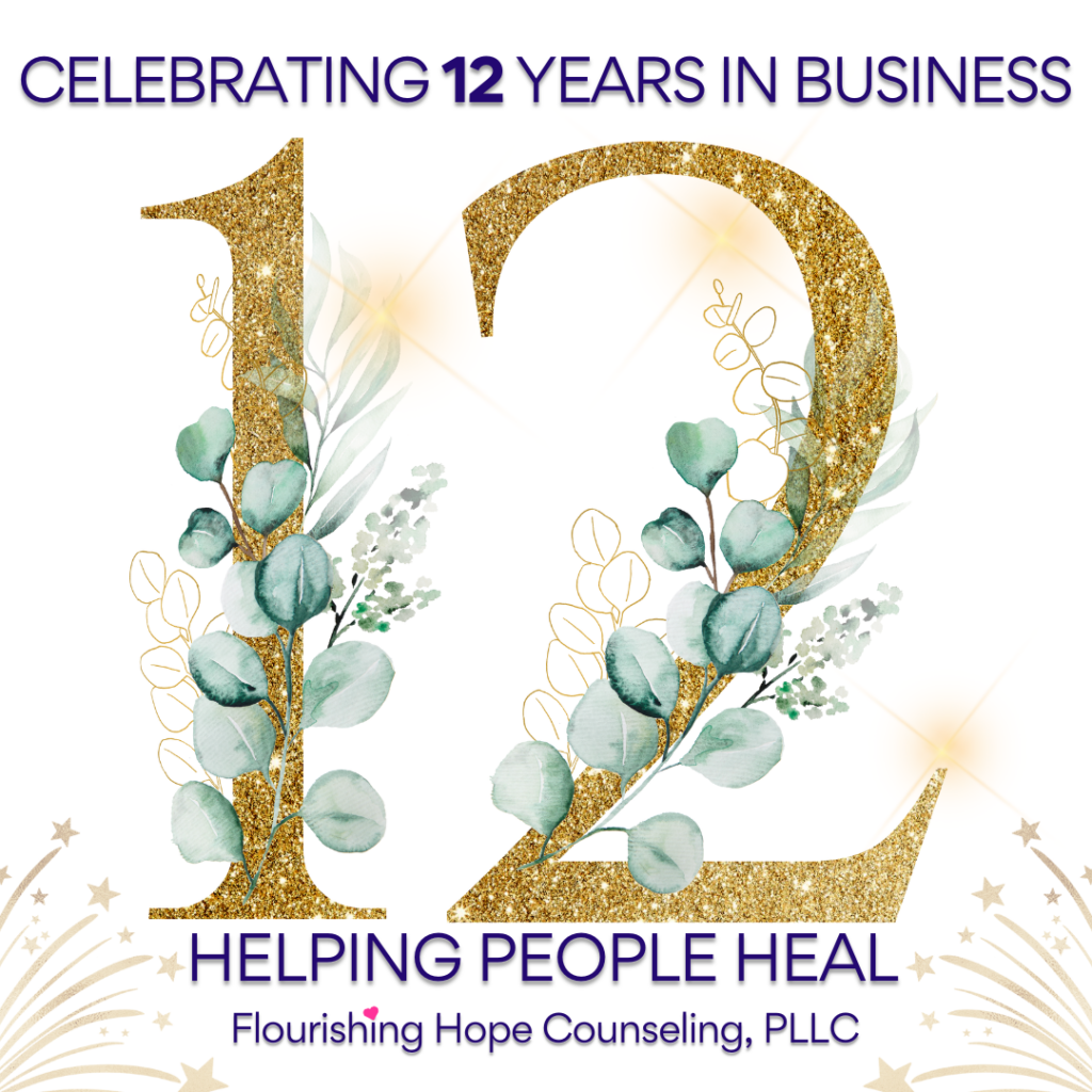 A sign that says celebrating 12 years with flowers on it.